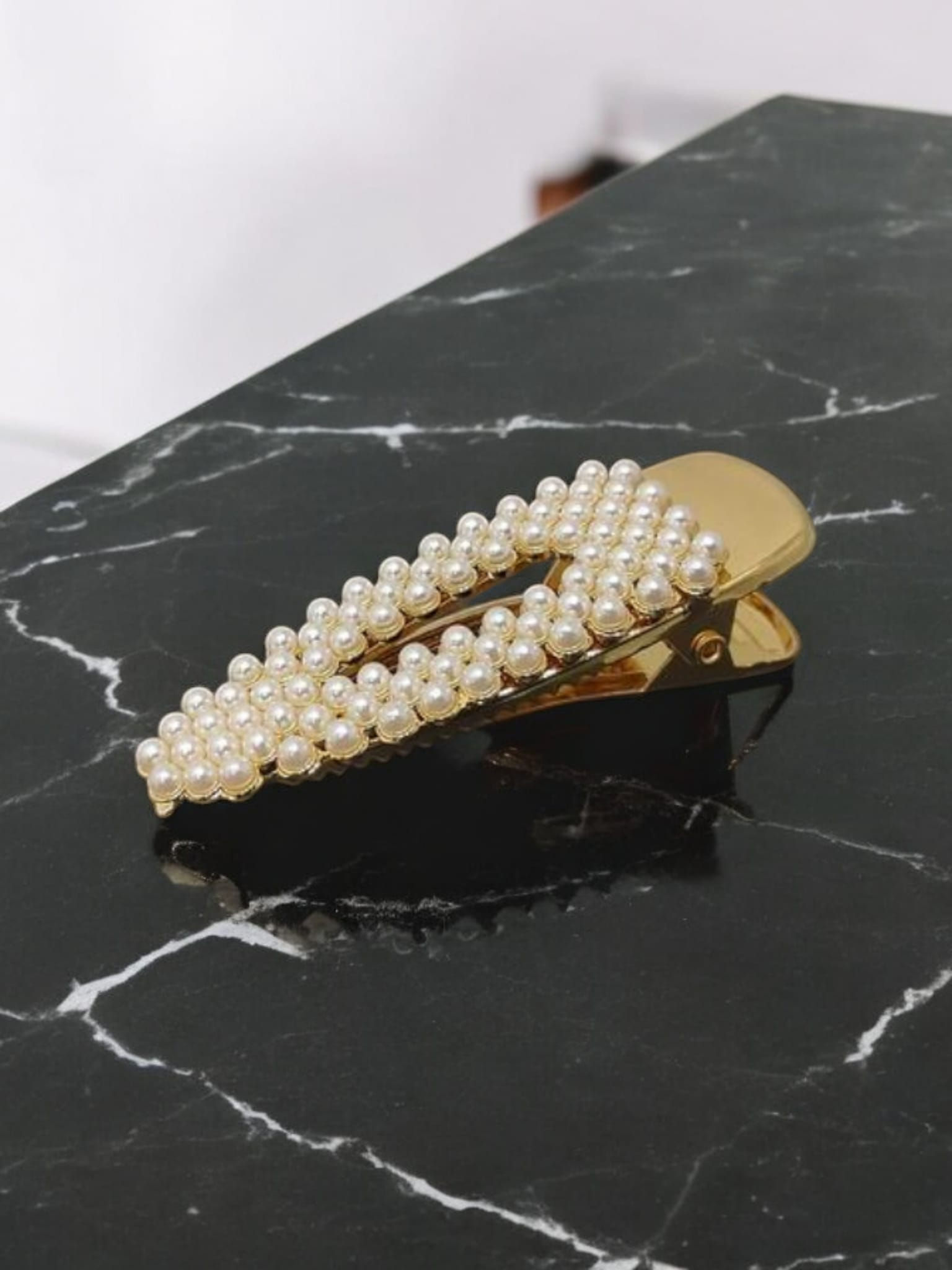 pince à cheveux perles dorée