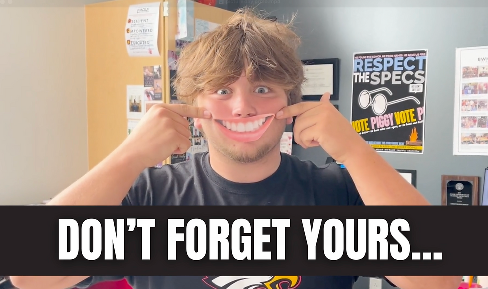 Yearbook staffer in video shows off the fun practical effect of enlarged smile tapped over his mouth