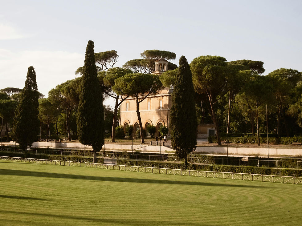 A peaceful park in Rome with ancient Roman ruins, representing one of the best quiet places to stay in Rome near Casa Relli.