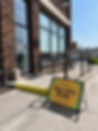Open Arts Studio sidewalk sign
