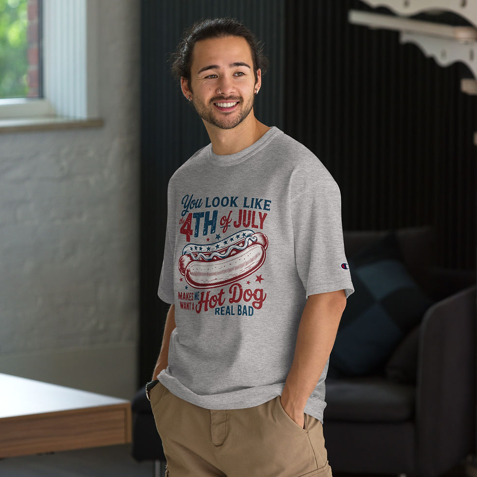 Thumbnail: Model wearing Champion t-shirt with graphic saying You look like the 4th of July makes me want a hotdog real bad.