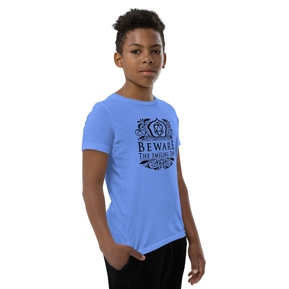 Thumbnail: Model wearing Bella Canvas youth t-shirt with graphic saying beware the smiling dm.