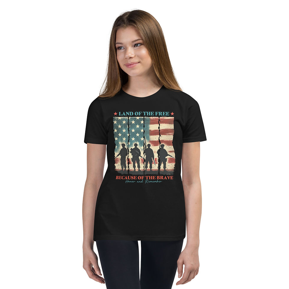 Bella Canvas youth t-shirt with a graphic of soldiers in front of American flag saying land of the free because of the brave.