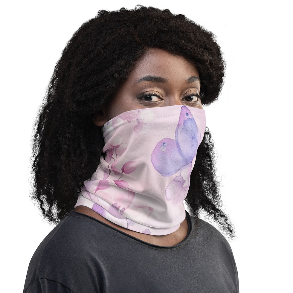 Model wearing a neck gaiter with pastel butterflies and flowers.