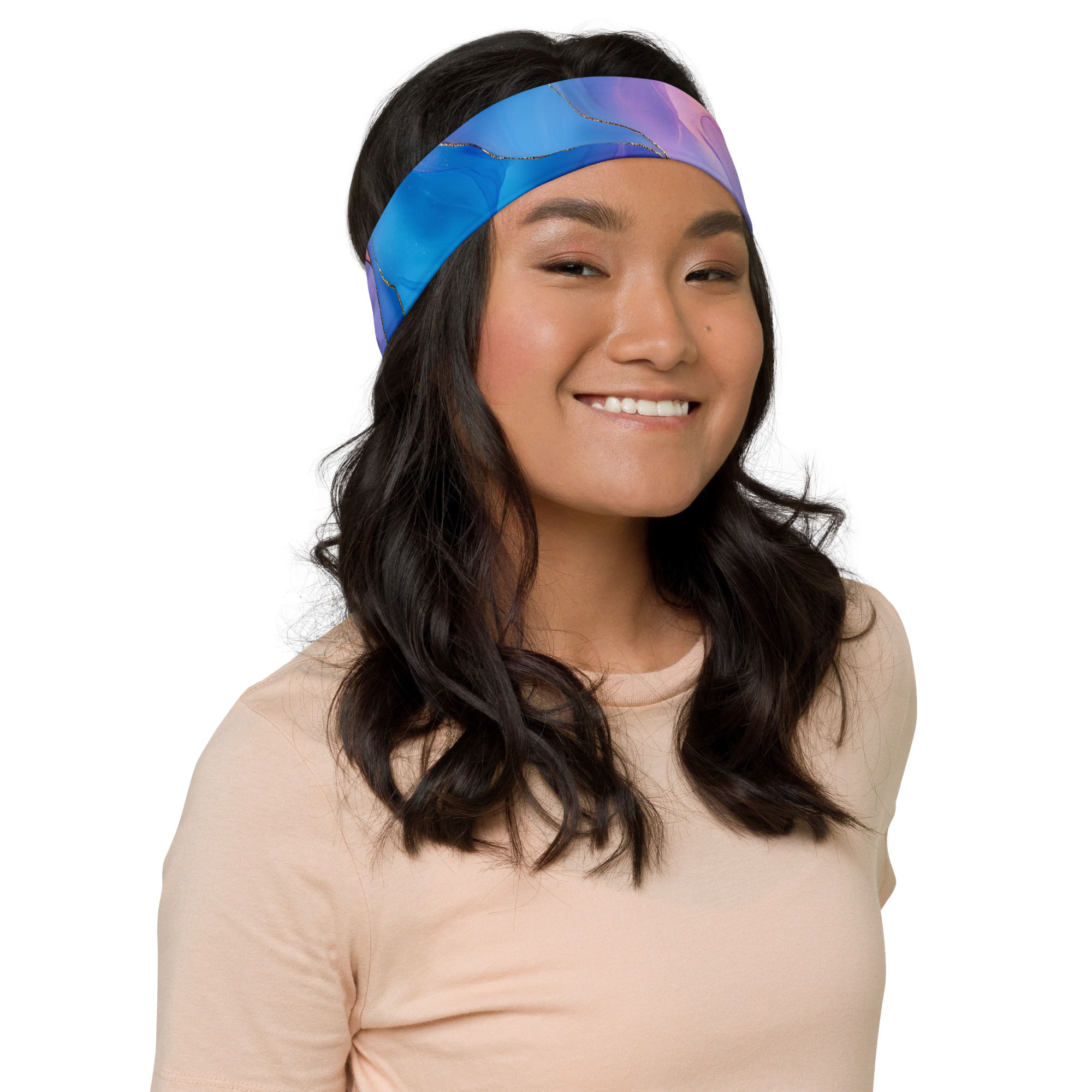 Model wearing a headband with blue, pink, and gold alcohol ink pattern.