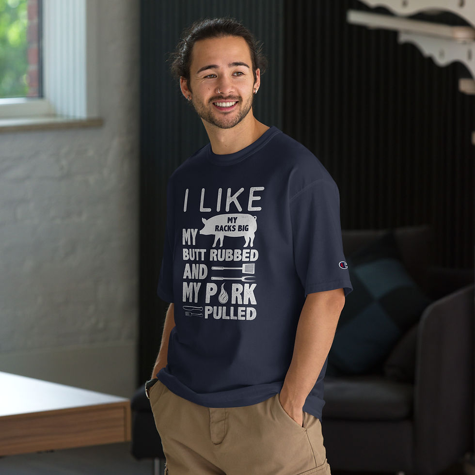 Thumbnail: Model wearing navy champion t-shirt with graphic stating I like my racks big, my butt rubbed, and my pork pulled.
