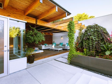 Image of a charming midtown bungalow in Salt Lake City, showing a modern yet classic design with large windows, an open-plan layout, and situated in a vibrant urban area, constructed by Sol Builders.