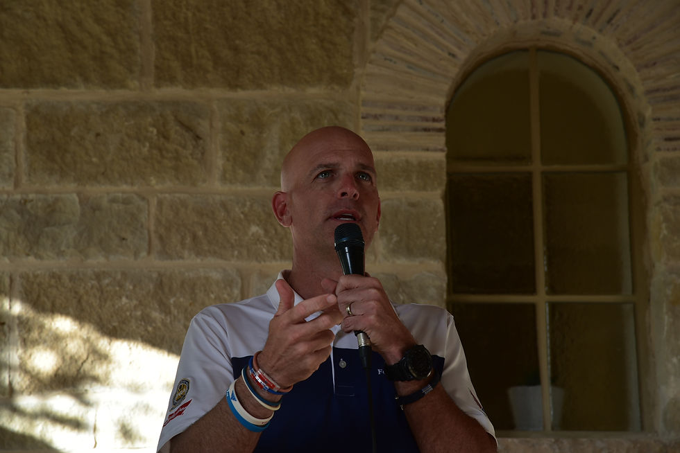 Major Dan Rooney addresses the attendees