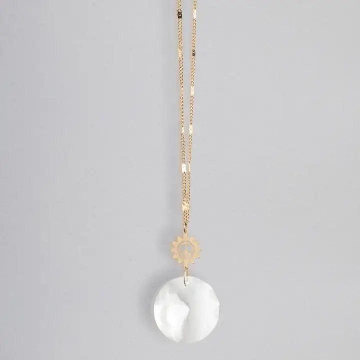 Thumbnail: Long gold chain necklace with iridescent shell pendant and small yellow bead.