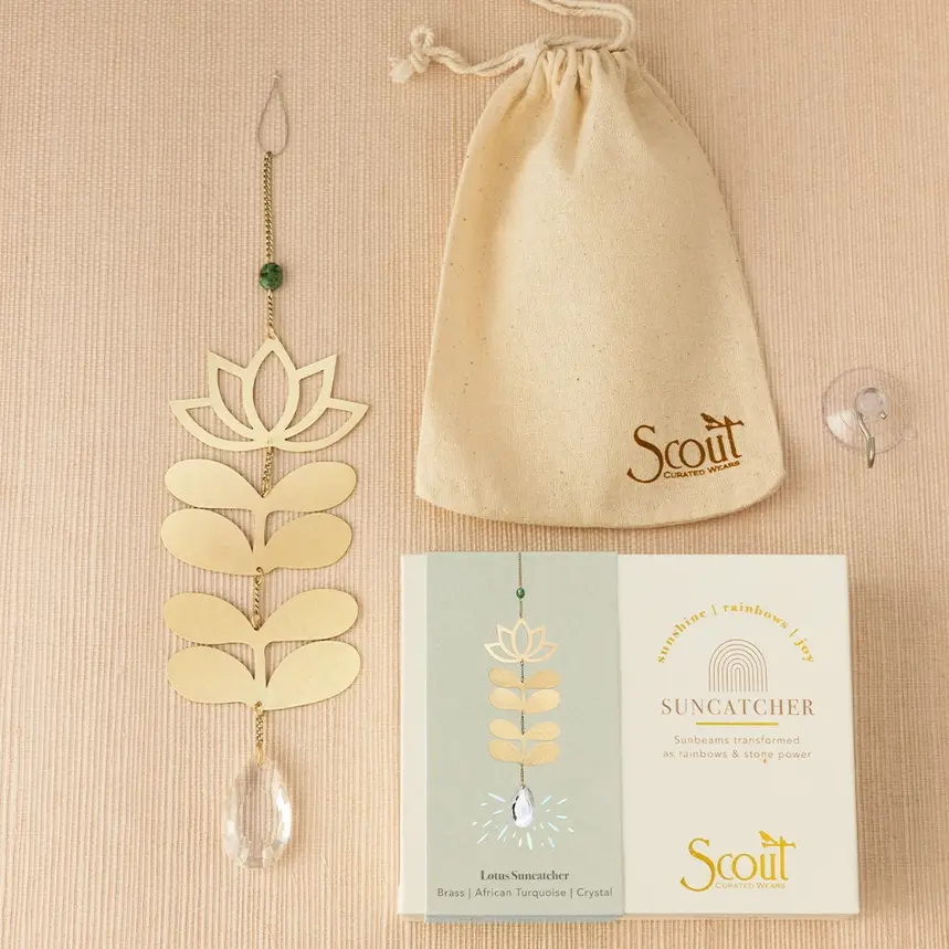Thumbnail: Golden lotus and leaf wall hanging with crystal, pouch, and box