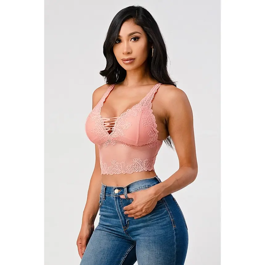 Thumbnail: Woman in pink V-neck stretch crop top