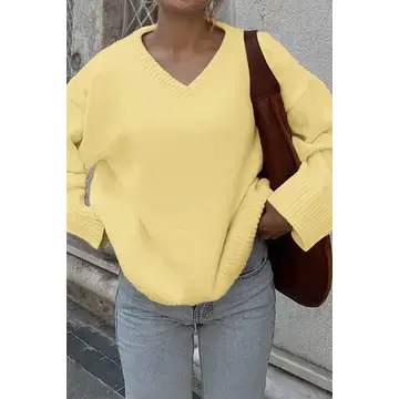 Thumbnail: Woman in yellow sweater and jeans