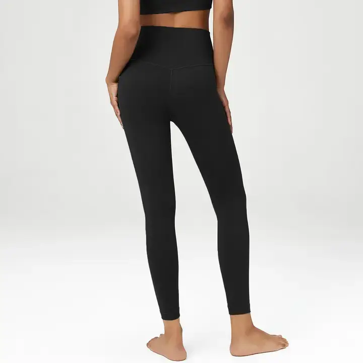 Thumbnail: Woman wearing black leggings from behind