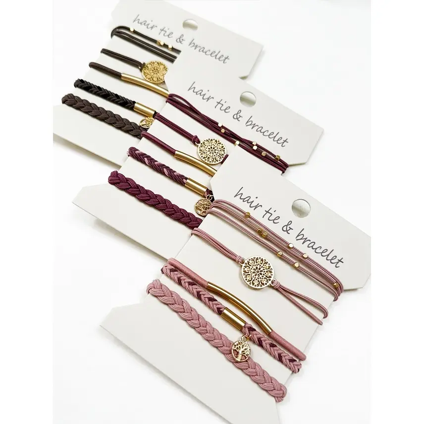 Thumbnail: Four sets of hair ties and bracelets on white cards
