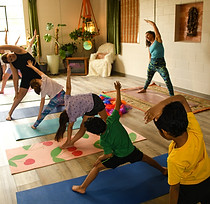 kids posing for yoga class