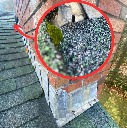 Chimney flashing failure with visible hole causing roof leak in Winchendon MA