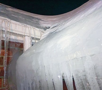 Emergency ice dam removal during winter conditions in Massachusetts