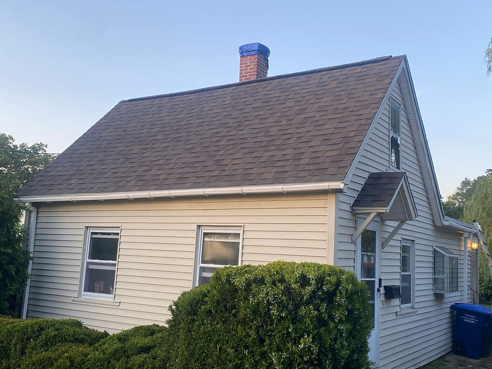 New architectural asphalt shingle roof installed on a cape style home in Leominster MA by Brian at R