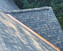 Copper hip flashing detail on an Owens Corning Duration Designer shingle roof in Worcester, Massachusetts