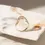Thumbnail: Curved White Zirconia Ring