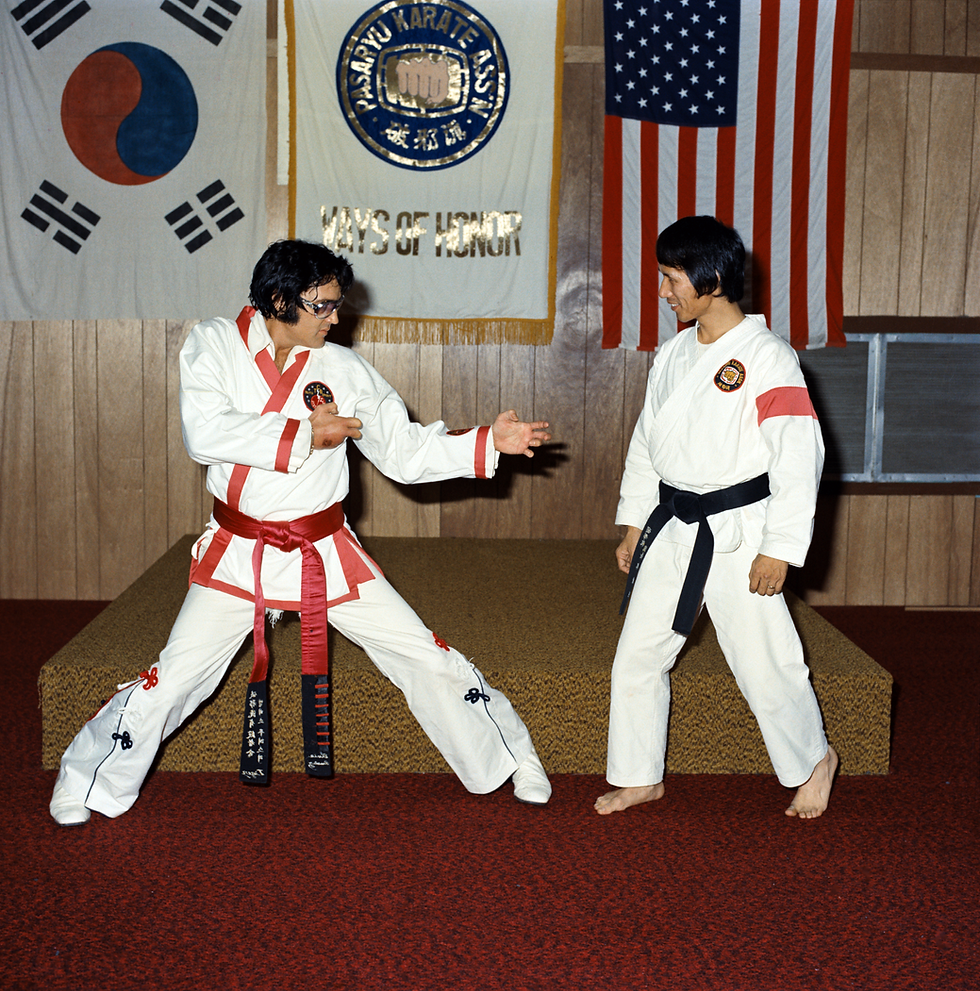 Example of the flags in a Dojo with Elvis and Kang Rhee