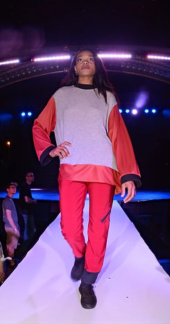 runway photo red pants grey tunic 