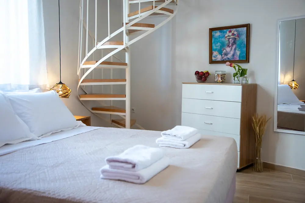 Bright bedroom with loft staircase, Axiotou House I, Aegina