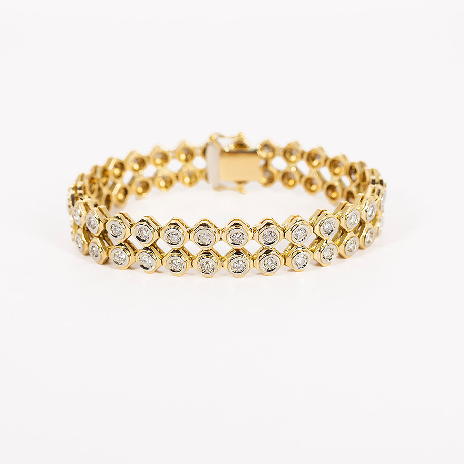 bracciale in oro giallo con doppia fila di diamanti John Oliver gioielleria firenze