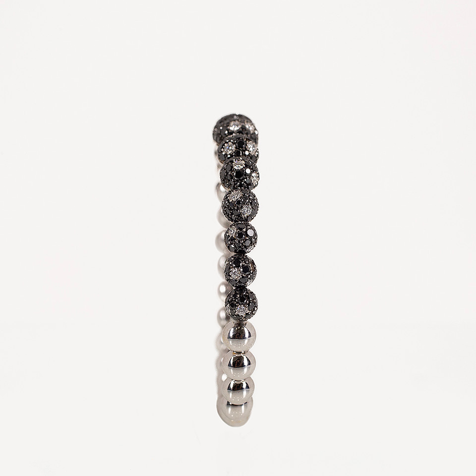 BRACCIALE RIGIDO CHIUSURA A CALAMITA MOTIVI A SFERA IN ORO BIANCO CON PAVÈ DI DIAMANTI NERI DESIGN ITALIANO IDEA REGALO