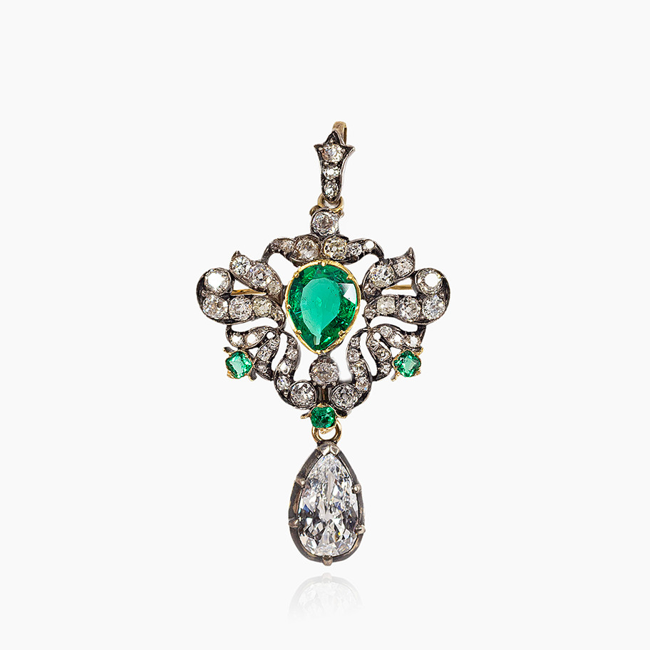 spilla vintage in oro bianco con diamanti e smeraldo antiquariato John Oliver gioielleria firenze