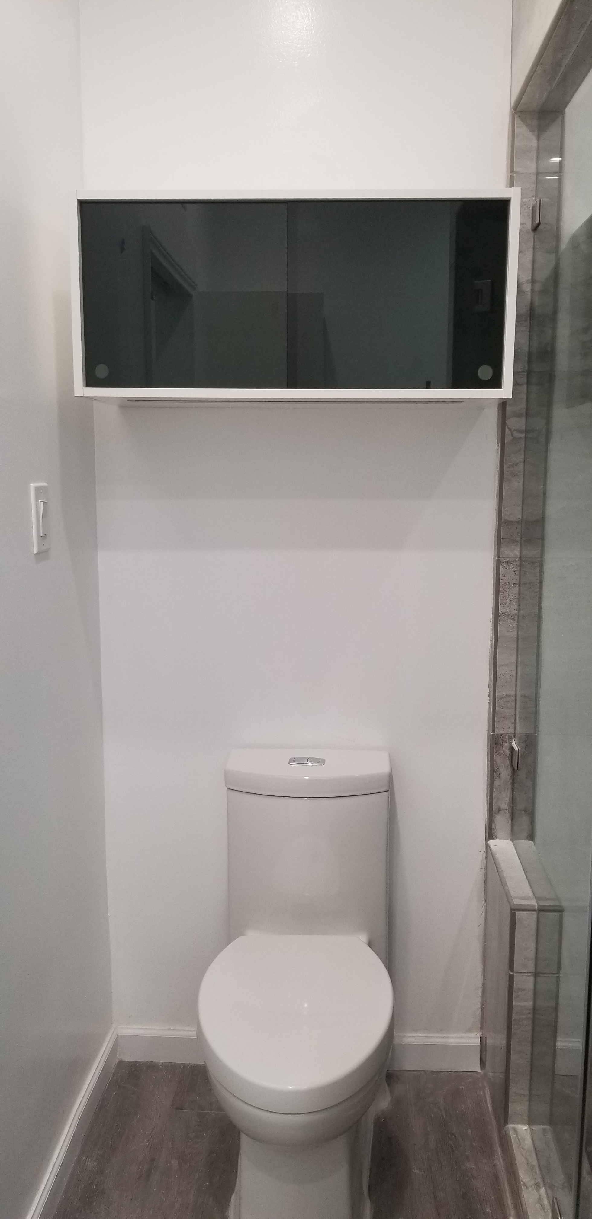 cabinets for bathroom over Toilette