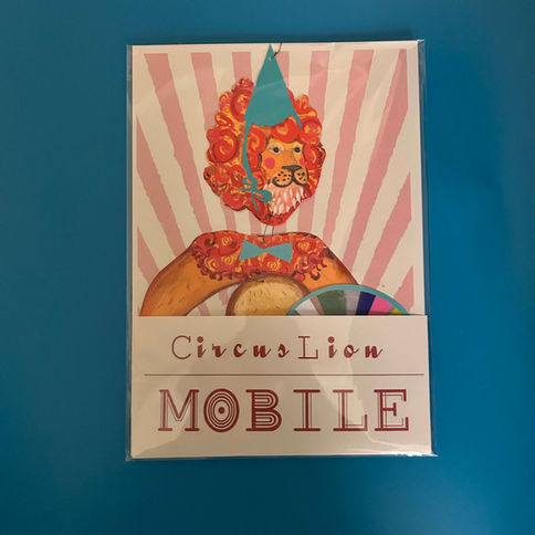 Circus Lion Mobile:  A whimsical mobile kit featuring a lion in a party hat