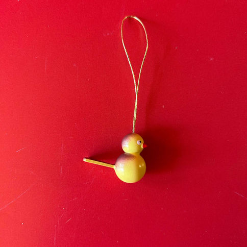 Small yellow wooden bird ornament