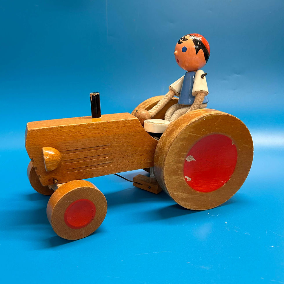 Wooden toy tractor with driver