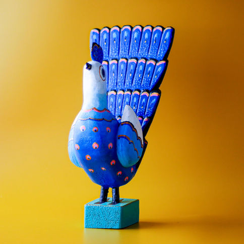 Blue wooden bird figurine, peacock-like tail