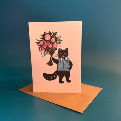 Greeting card: Cat in denim vest holding flowers