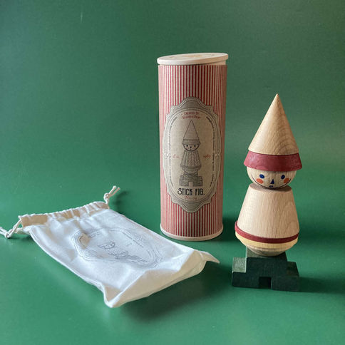 Wooden spinning top toy in packaging