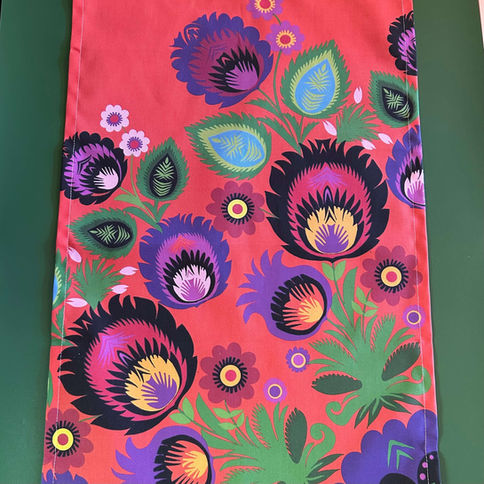 Red tea towel with Polish floral papercut print