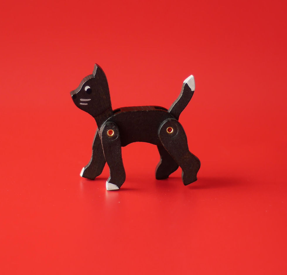 Black cat wooden toy figurine