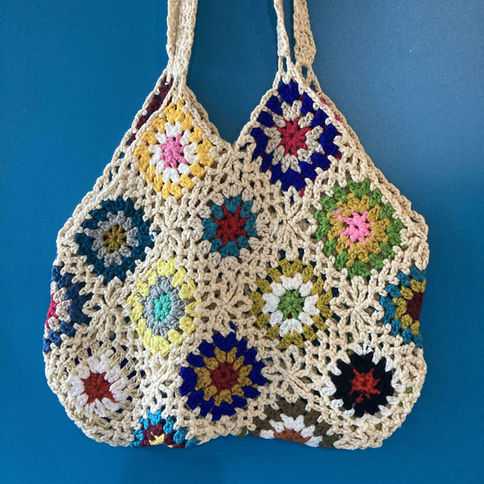 Colorful crocheted granny square tote bag