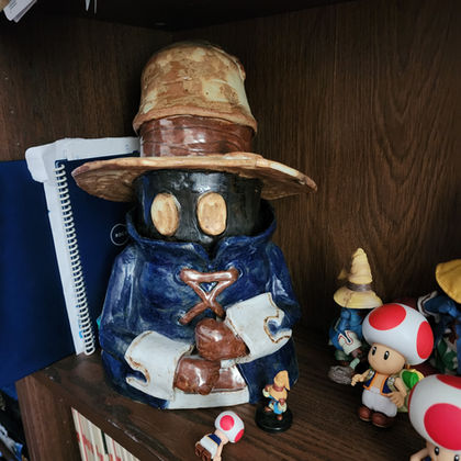 Vivi shaped cookie jar sitting on a shelf