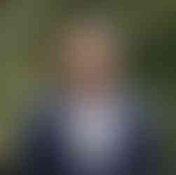 A photo of Adrian Boafo.