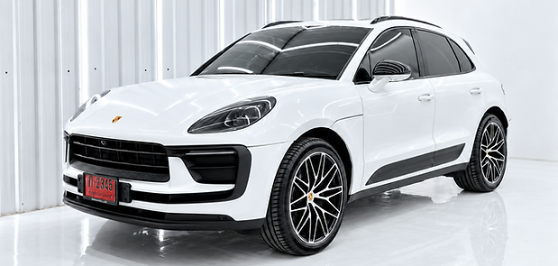 White Porsche Macan in WRAPTOR studio.png