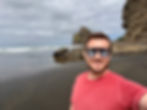 Enjoying the black sand beaches of Piha in New Zealand