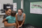 dr abby smiling at child