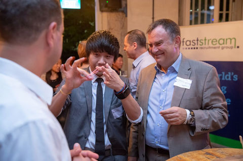 Magician performing magic trick for Faststream