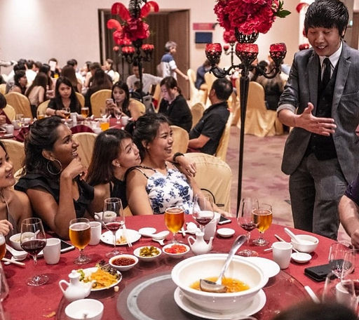 Magician performing roving magic st Singapore wedding