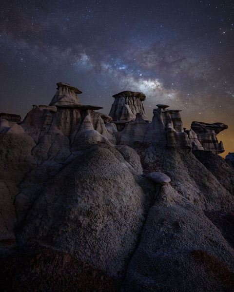 Group hoodoos New Mexico Bisti Badlands Milky Way Night Scene