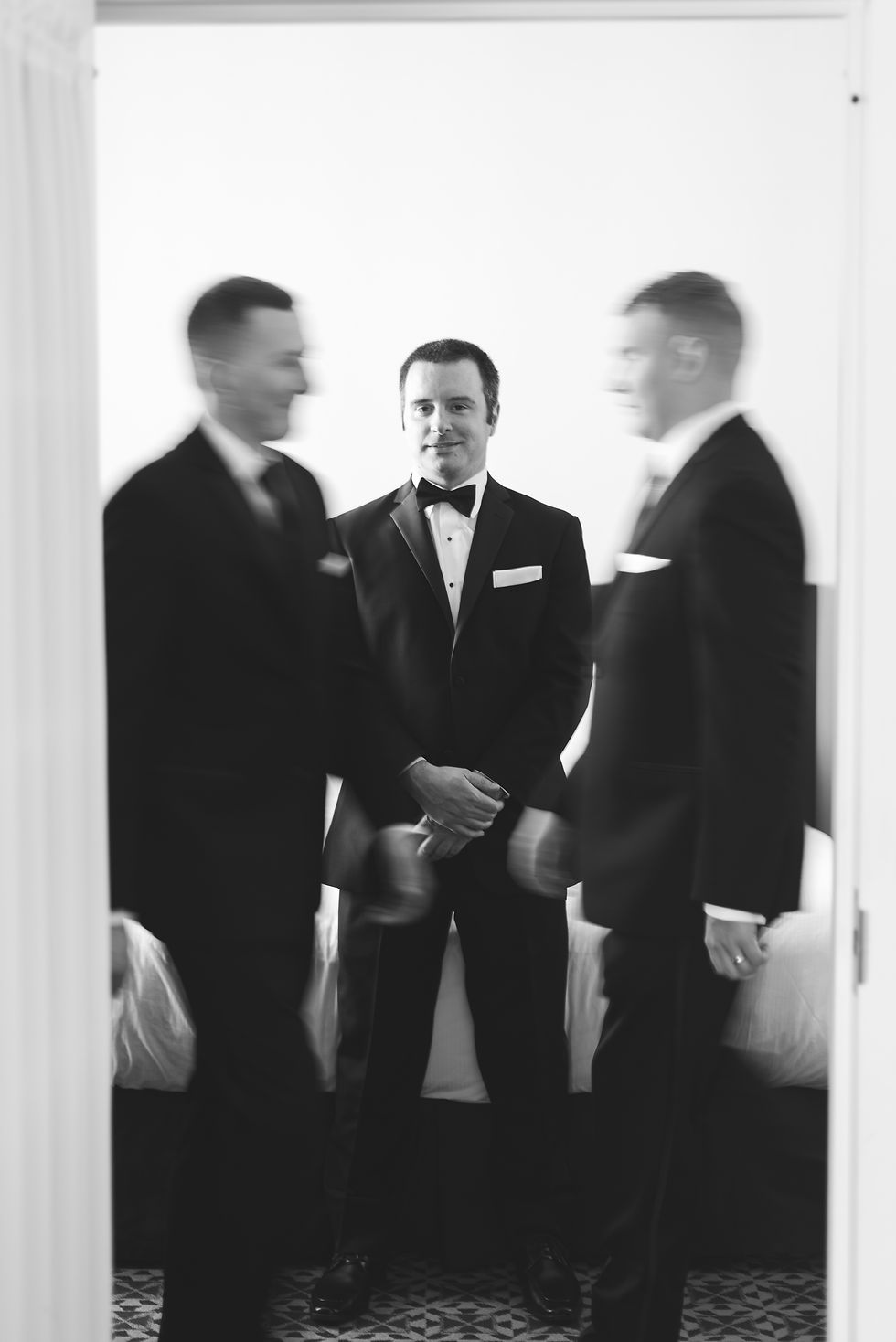 Groom getting ready for winter wedding day at The Merion in Cinnaminson, New Jersey. Photographed by South Jersey region wedding photographer Madison Neumann Photography.