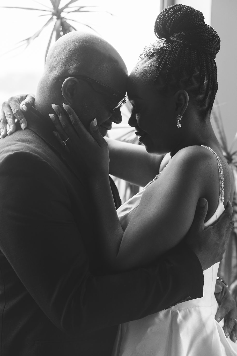 Future bride wears her engagement ring and embraces future husband. Engagement session at Lark in Bala Cynwyd, PA, photographed by South Jersey, Philadelphia based wedding photographer Madison Neumann Photography.